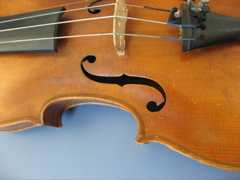 Picture of a violin body with f hole